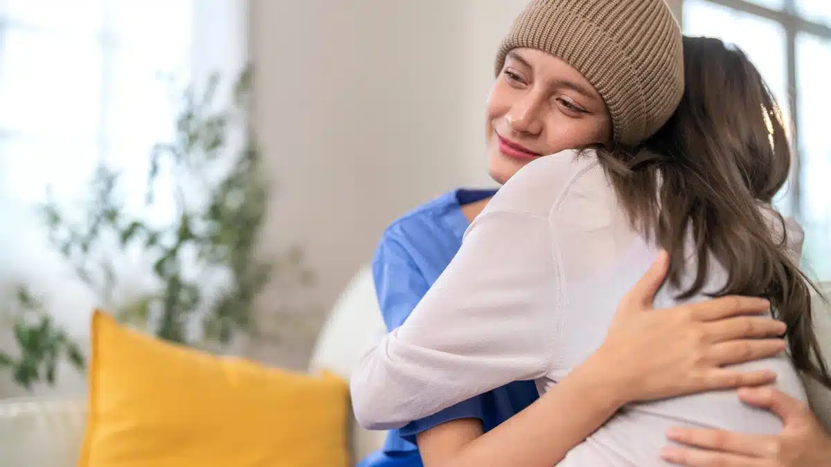 Cancer Patient Hugging Their Daughter